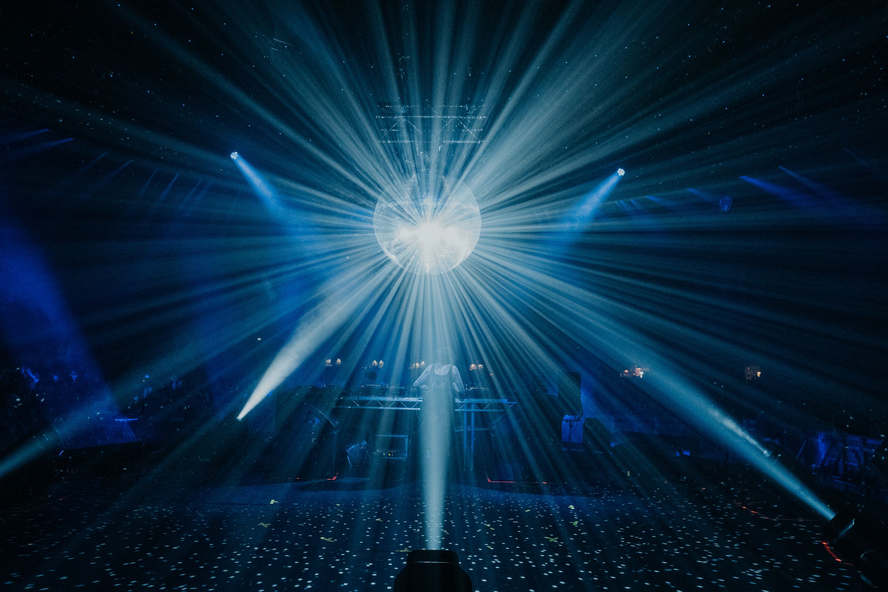 A starburst of blue light over the crowd